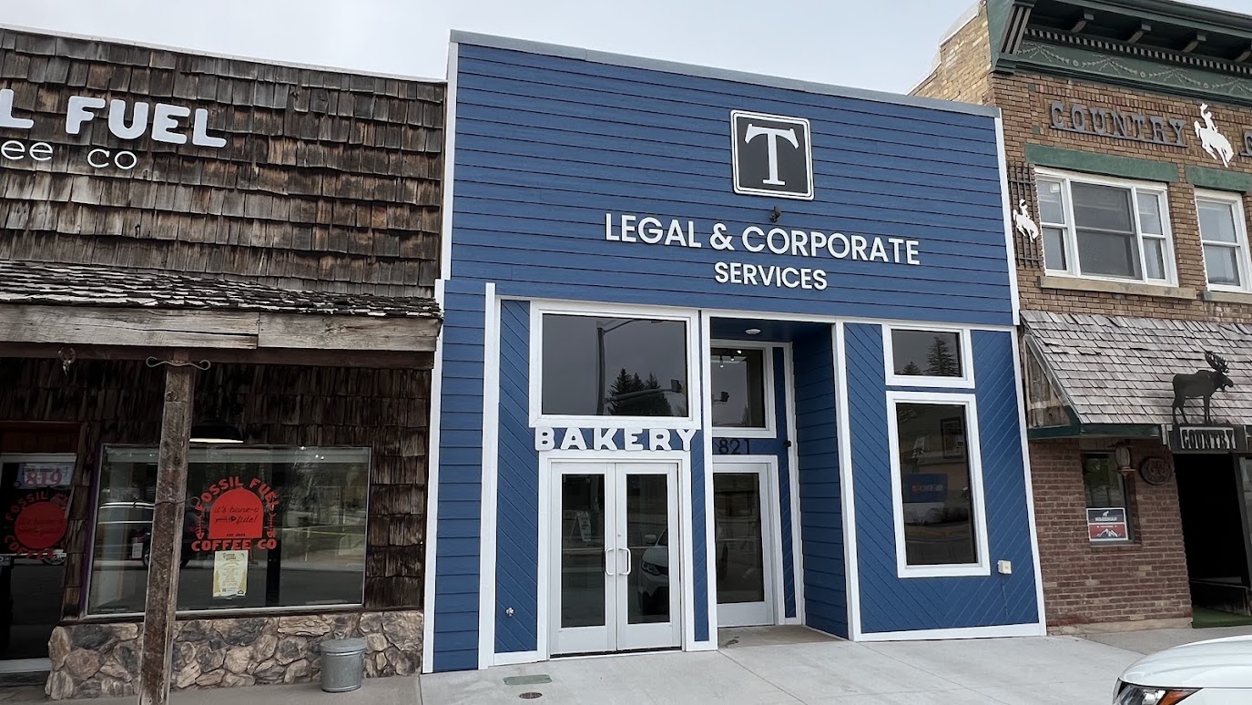 The 821 South Main building, a blue storefront office on Main Street in downtown Kemmerer, Wyoming